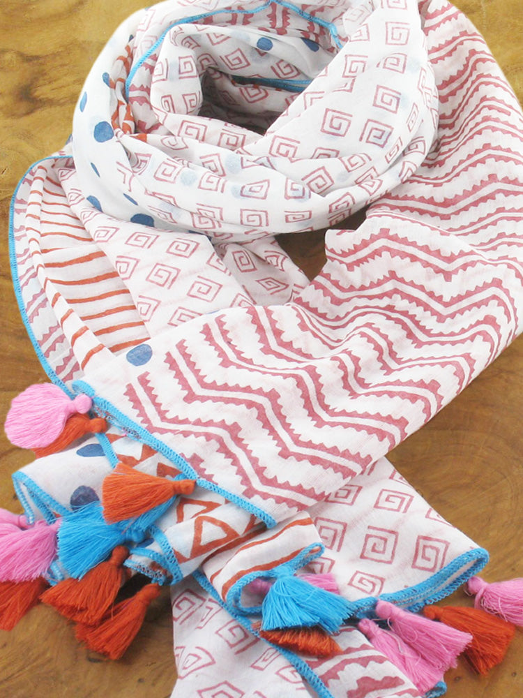 SUZIE BLUE – BLOCK ORANGE AND COPPER, PRINTED COTTON SCARF WITH MIXED MOTIF COLOURS DESIGNED WITH MULTI TASSEL TRIMMED EDGES